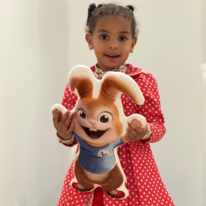 girl holding bunny