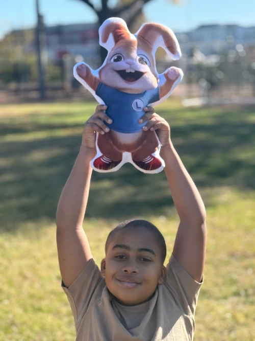 Boy holding bunny